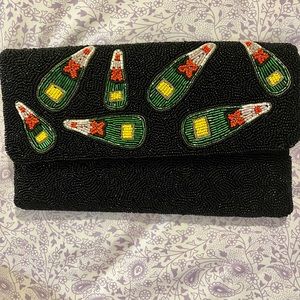 Beaded Francesca’s clutch with gold chain with a fun sparkly design! *NWT*